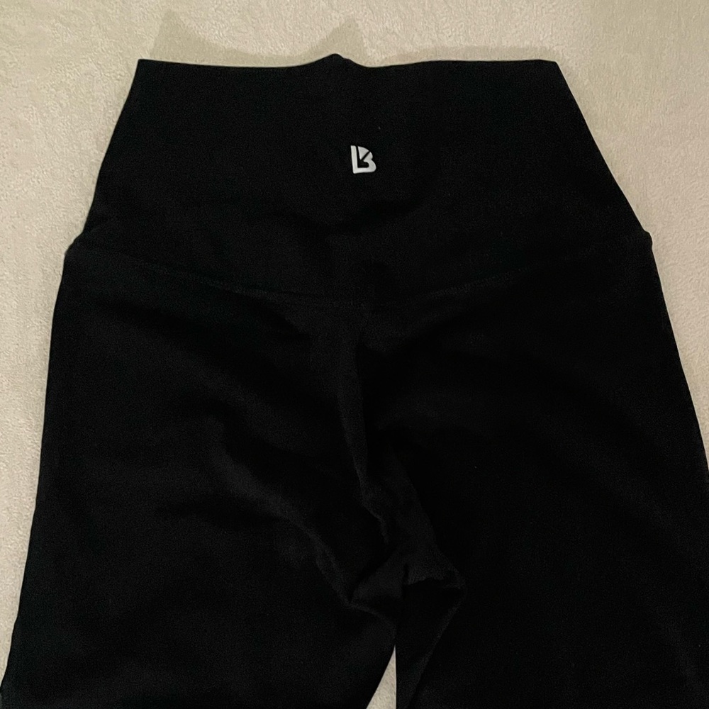 Buffbunny black leggings with mesh on the leg